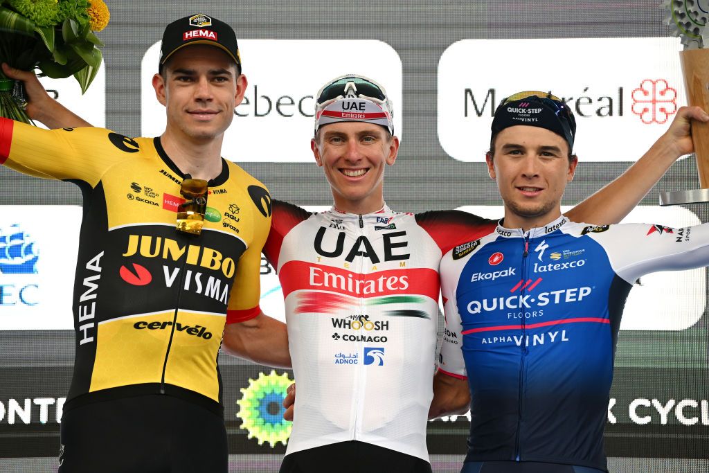 MONTREAL QUEBEC SEPTEMBER 11 LR Wout Van Aert of Belgium and Team Jumbo Visma on second place race winner Tadej Pogacar of Slovenia and UAE Team Emirates and Andrea Bagioli of Italy and Team QuickStep Alpha Vinyl on third place pose on the podium during the podium ceremony after the 11th Grand Prix Cycliste de Montreal 2022 a 221km one day race from Montreal to Montreal GPCQM WorldTour on September 11 2022 in Montreal Quebec Photo by Dario BelingheriGetty Images