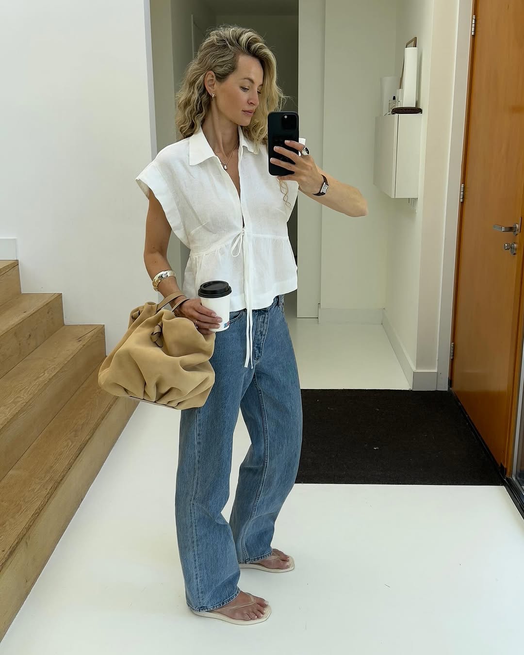 Influencer wearing barrel leg jeans