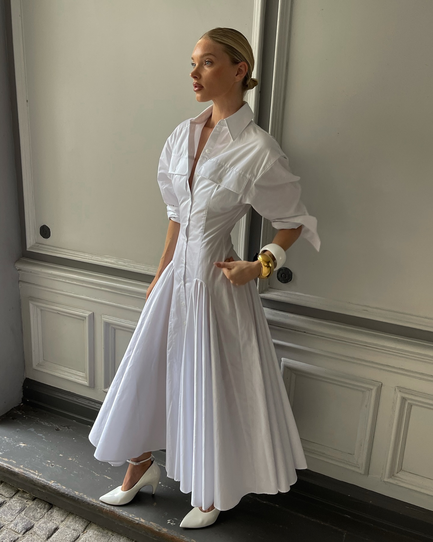 Elsa Hosk wearing a white shirt dress