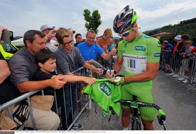 Peter Sagan finds time to sign autographs for his fans