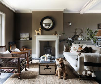 Wooden armchairs, white fireplace, white sofa