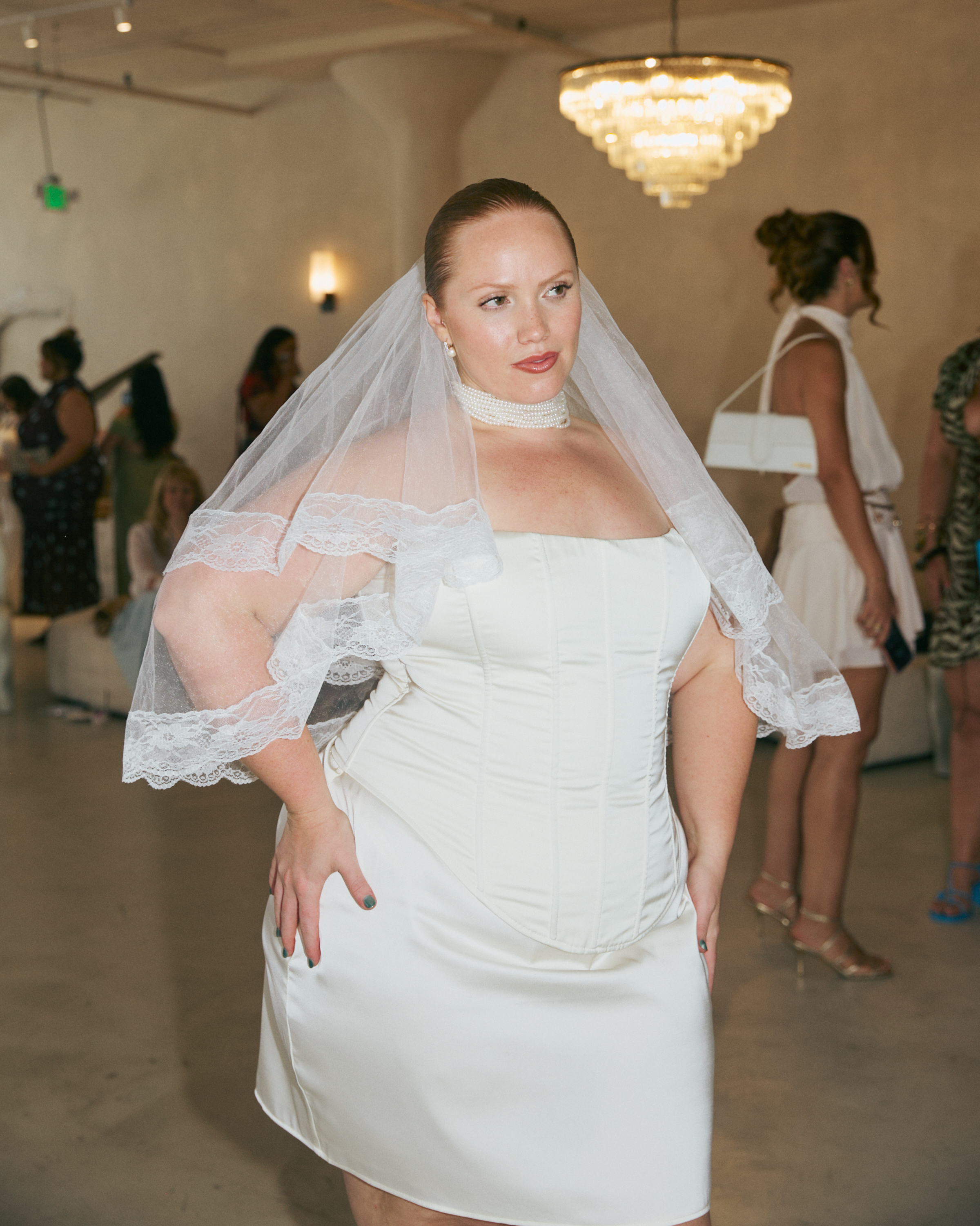 Models wear all white from Gia/irl x Emma Arletta Bridal