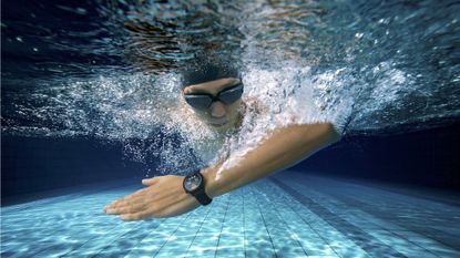 Man wearing a Huawei smartwatch while swimming