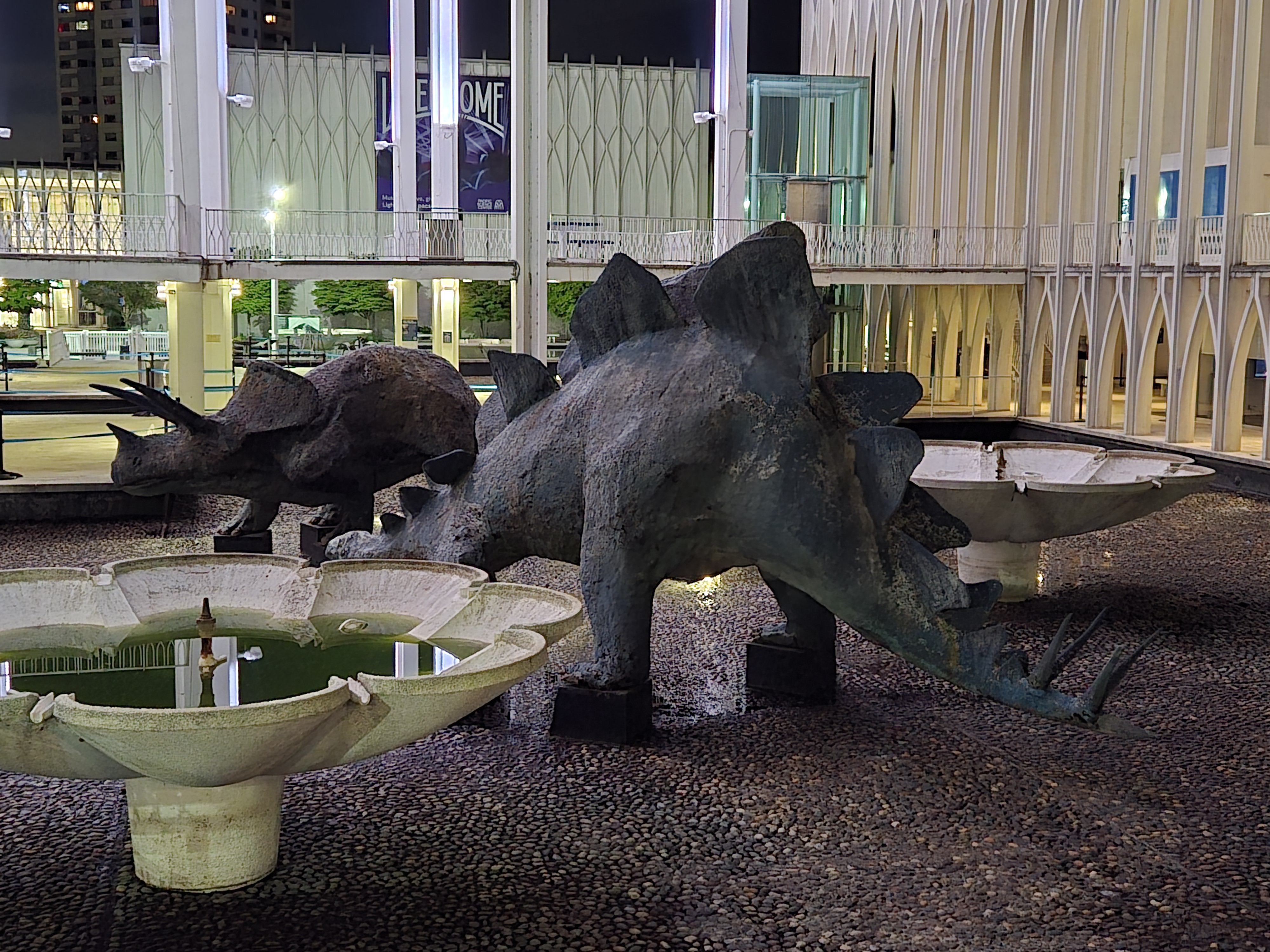 Stone dinosaur sculptures