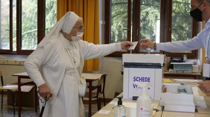 A nun votes in San Marino.