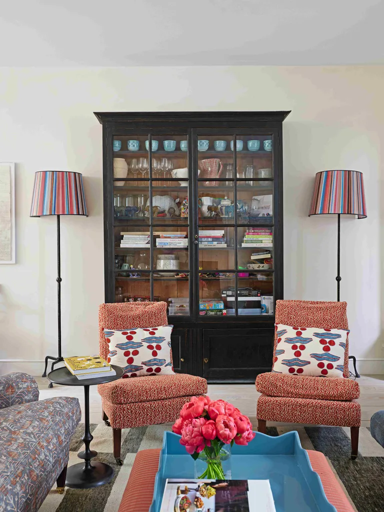 Living room with two armchairs and dresser