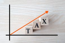 x and y axis with the word tax under a rising arrow
