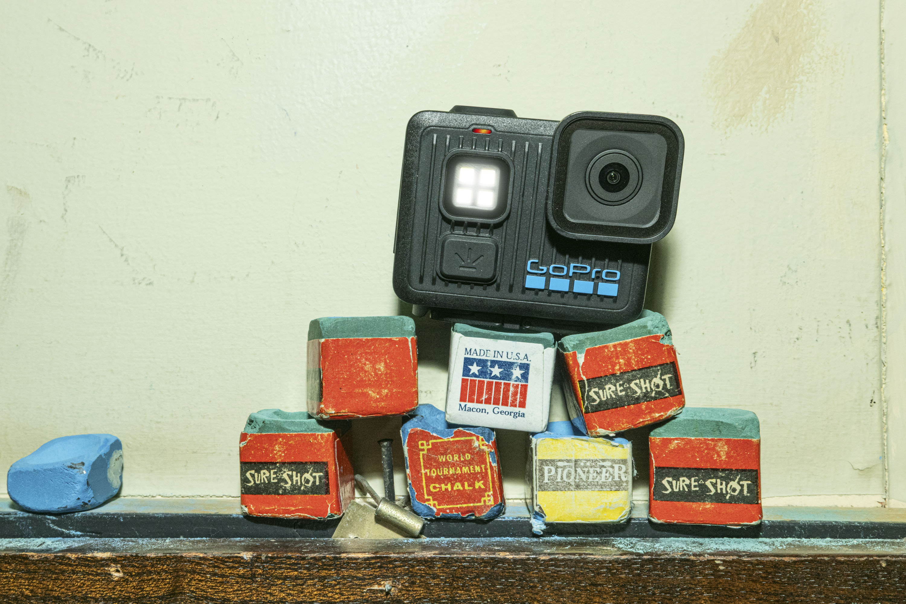 GoPro Lit Hero action cam balancing on bright colored wooden blocks