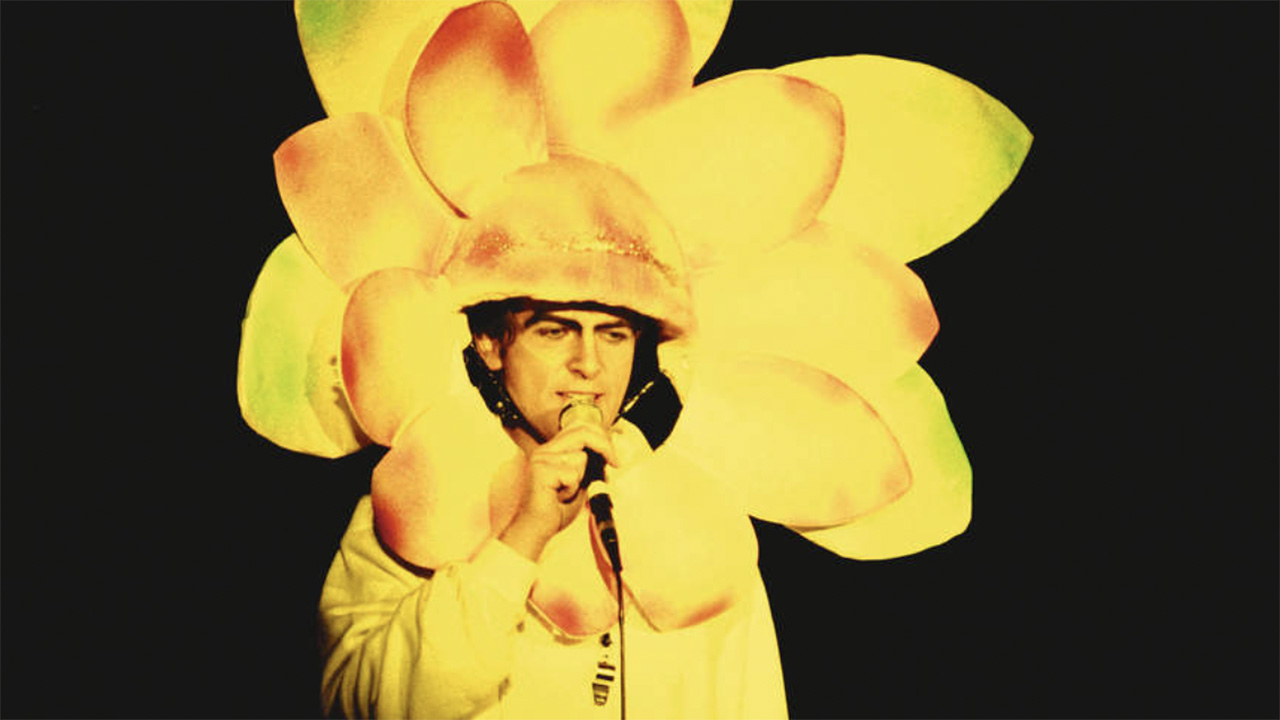 Peter Gabriel brings the flower mask back at Genesis&amp;rsquo; Six Of The Best show in 1982