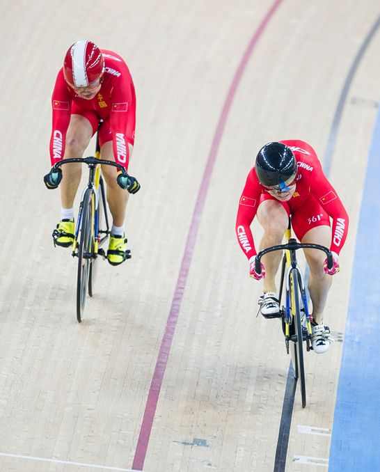 Lin Junhong and Guo Shuang of China compete on their Women's Sprint Quarter finals