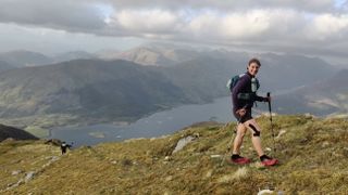 Jamie Aarons climbing a Munro