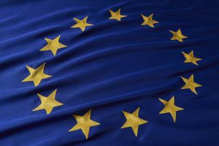 A close up image of the flag of the European Union featuring 12 stars