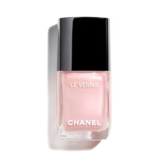 A product shot of Chanel Le Vernis in shade Songe D'été on a white background