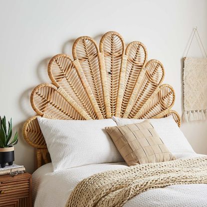 Petal cane headboard with white neutral bedding