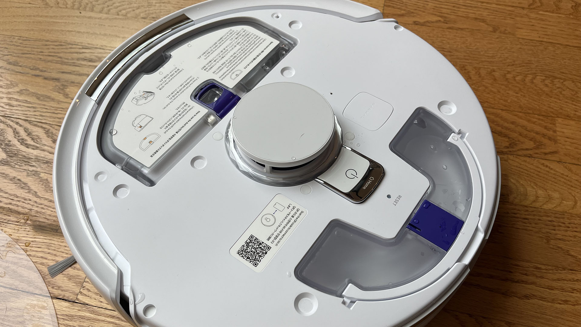 Narwal Freo X Plus robot vacuum with magnetic cover removed