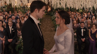 Kristen Stewart and Robert Pattinson as Bella and Edward getting married in Breaking Dawn Part 1