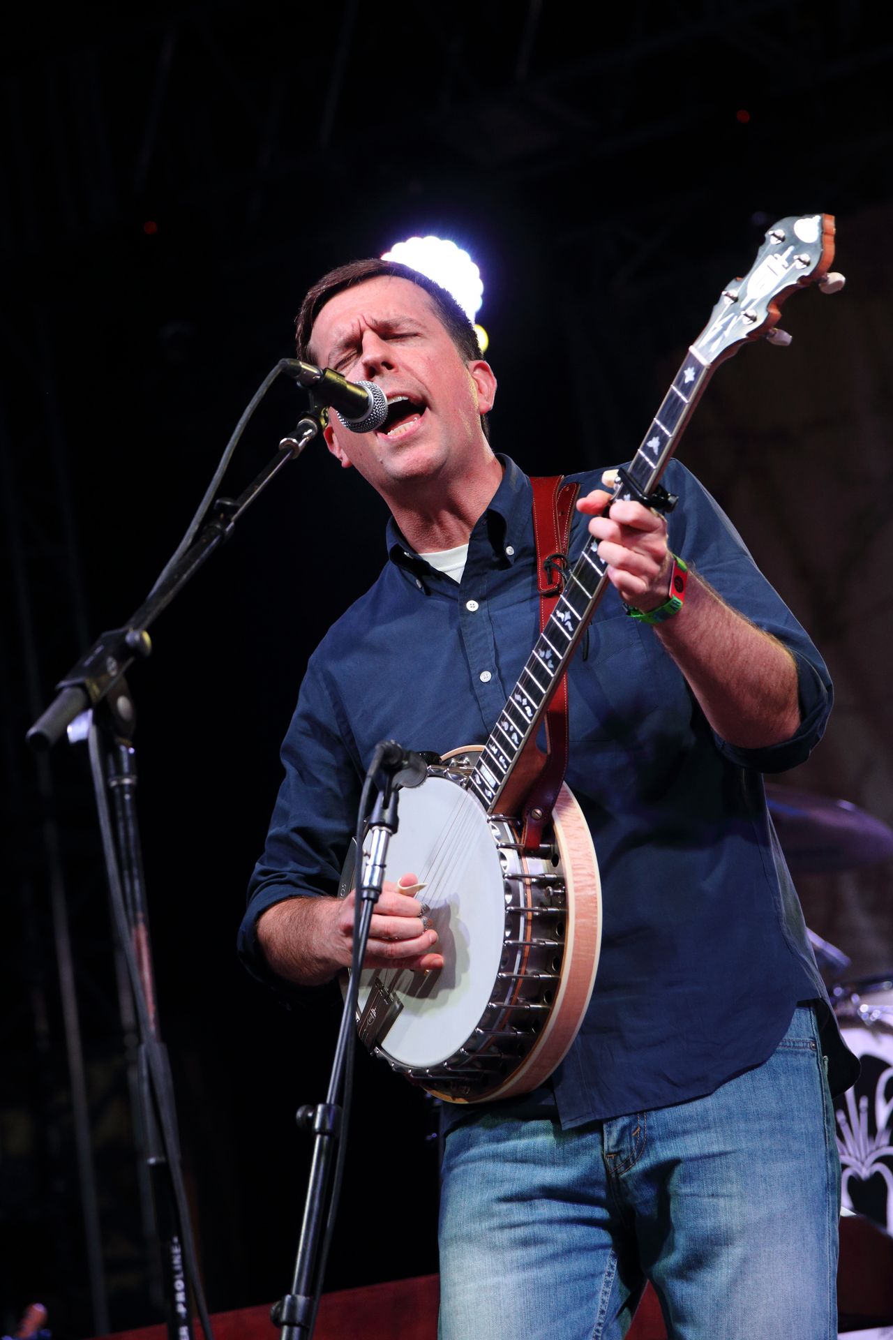 Ed Helms performing bluegrass music. 