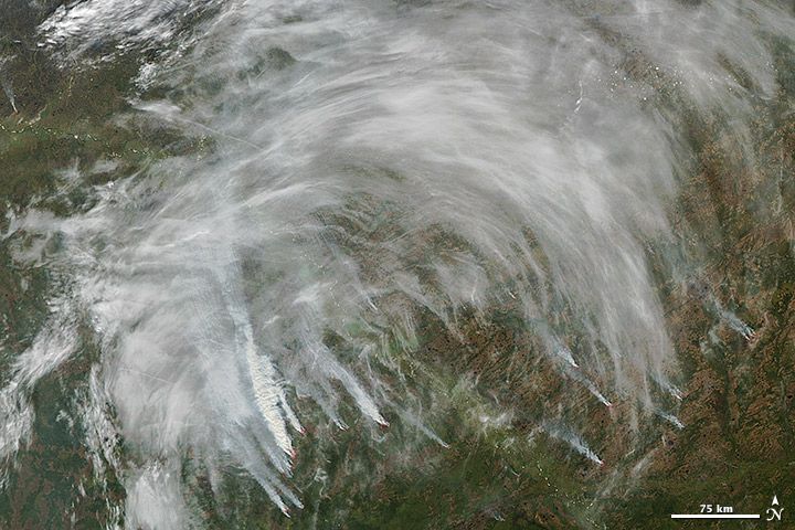 In this photo, taken on Sept. 11 by NASA&#039;s Aqua satellite, thick smoke billows from numerous wildfires near the Ob River in south-central Siberia. 