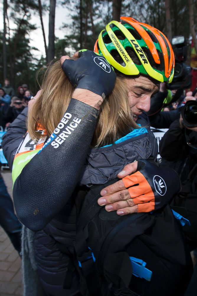 Wout Van Aert gets a hug after the Belgian championships