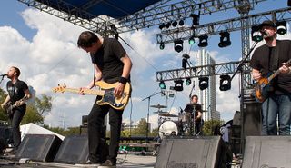 (from left) Braid's Bob Nanna, Todd Bell, Damon Atkinson and Chris Broach perform onstage at Auditorium Shores in Austin, Texas on November 3, 2012