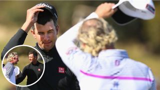 Adam Scott and Peter Wilson shake hands on the putting green