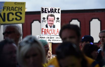 Protesters in England speak out against fracking.