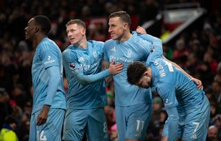 MANCHESTER, ENGLAND - DECEMBER 7: Chris Wood of Nottingham Forest celebrates scoring with Callum Hudson-Odoi, Elliot Anderson and Neco Williams during the Premier League match between Manchester United FC and Nottingham Forest FC at Old Trafford on December 7, 2024 in Manchester, England. (Photo by Visionhaus/Getty Images)