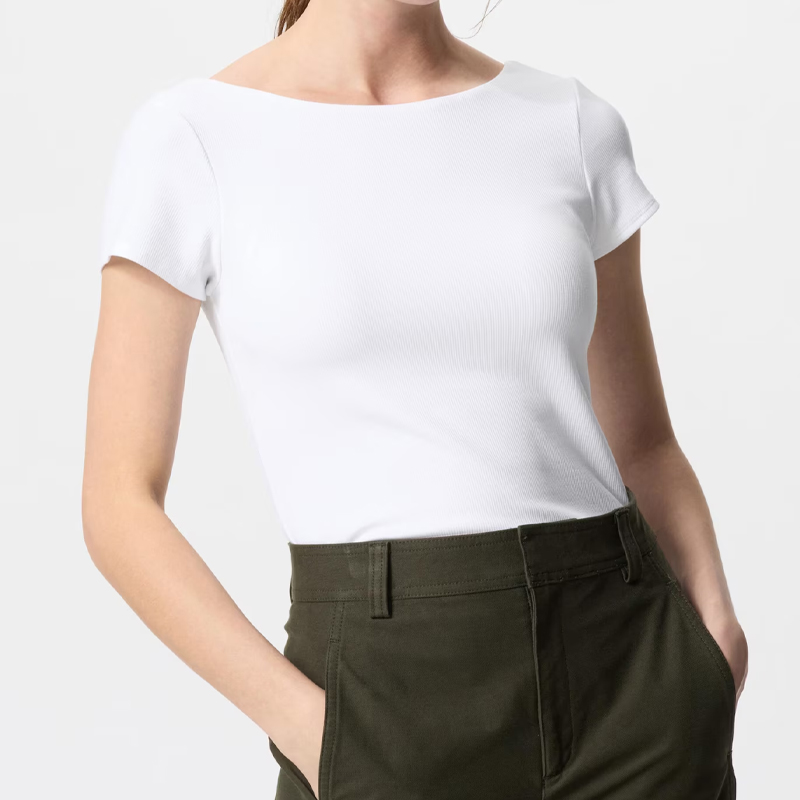 cropped image of a woman wearing a white uniqlo airism tshirt