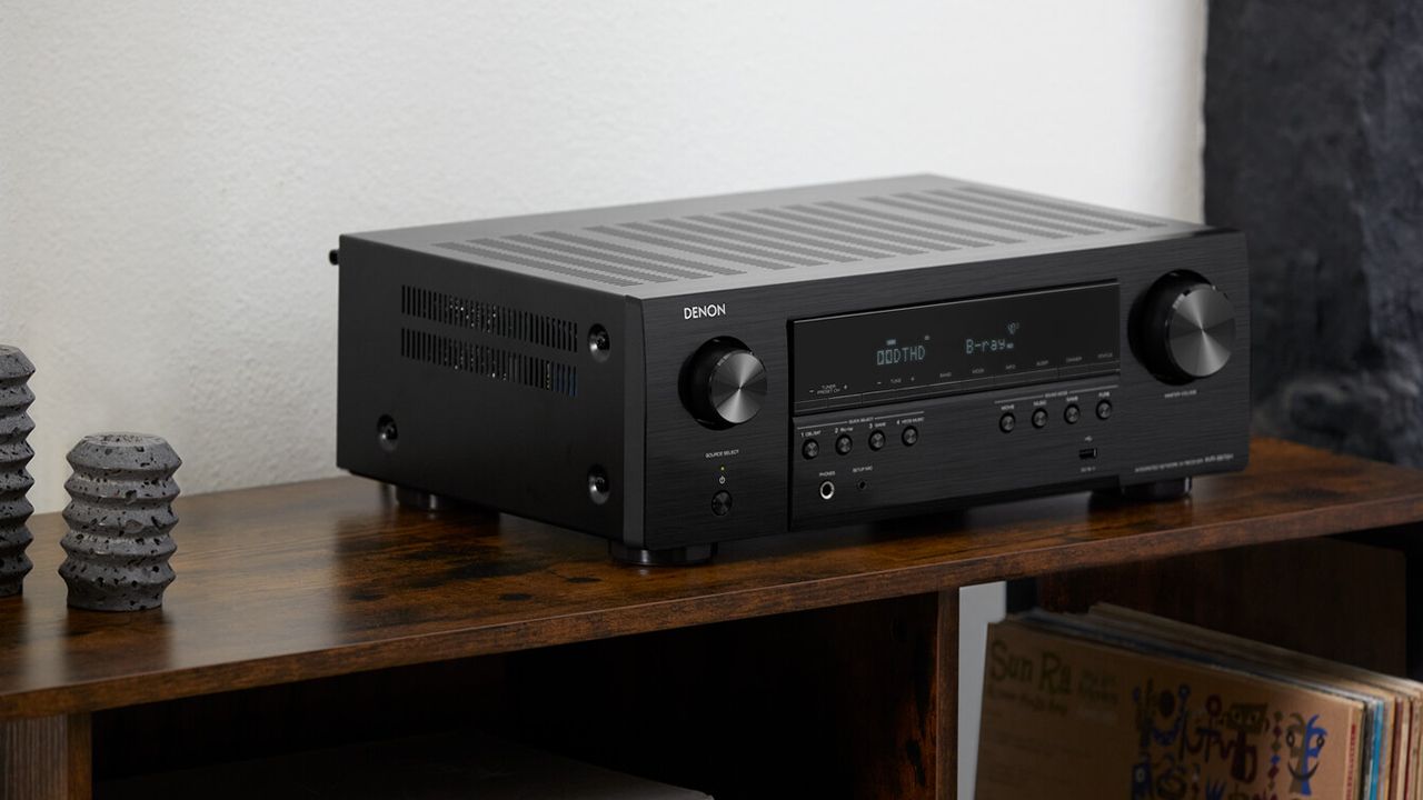 Denon AVR-S670H AV receiver on a bookcase