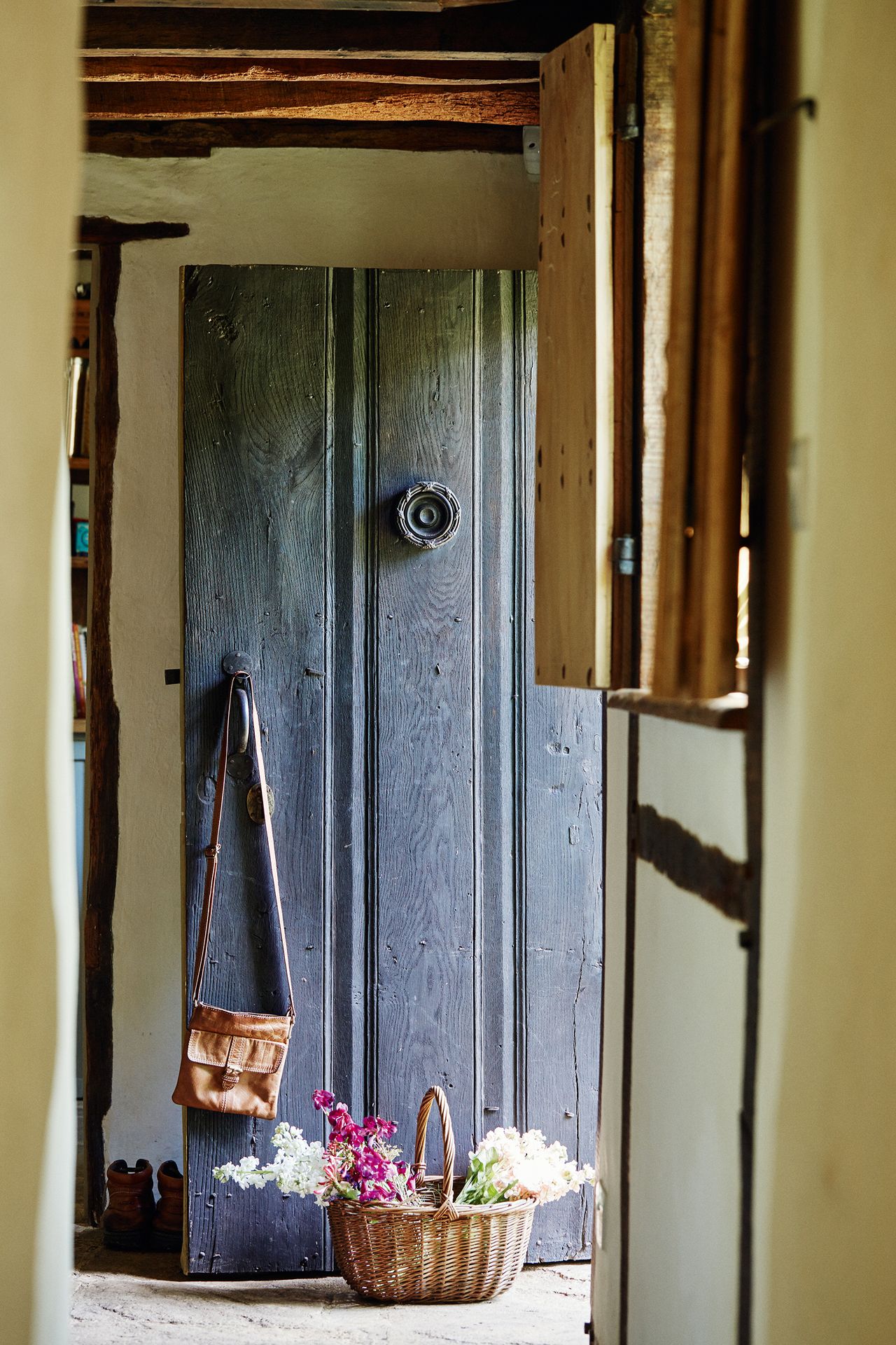 wooden front door in 17th century cottage