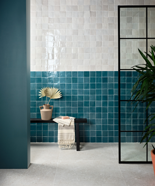 A bathroom with aqua blue Zellige tiles