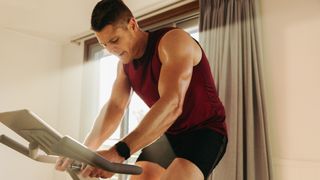 Man using exercise bike