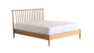 Solid oak bed frame with spindled headboard
