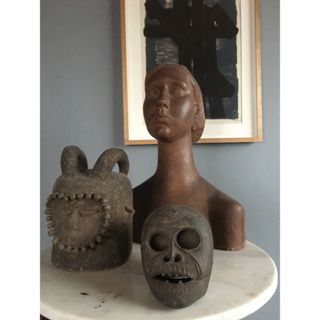 Busts on side table, collected by Tom Dixon