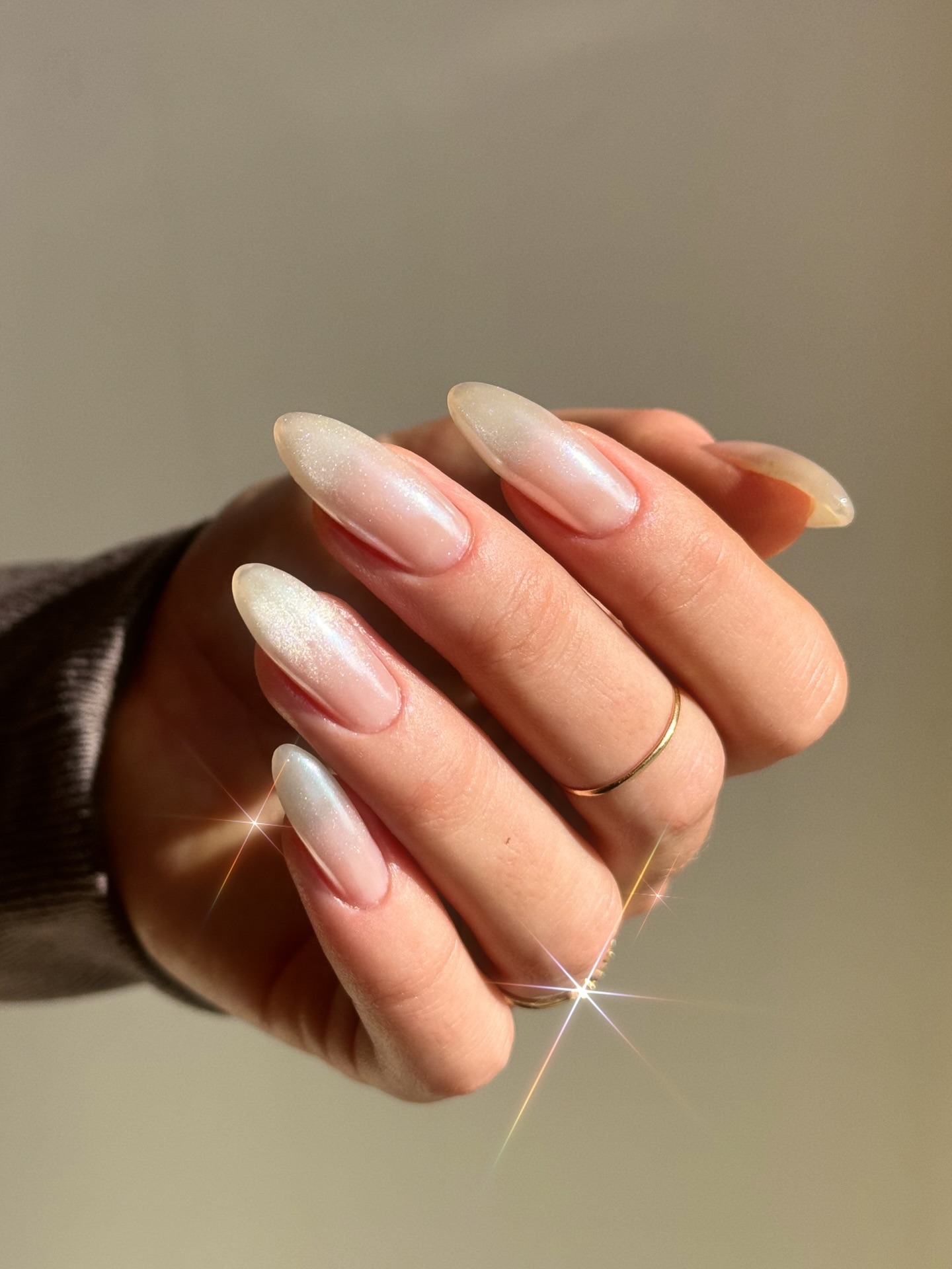 A sheer, shimmery manicure
