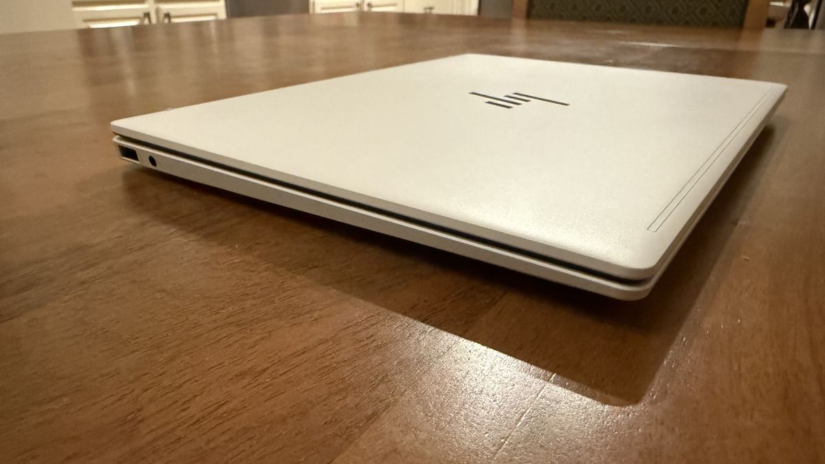 HP OmniBook 7 Aero laptop on a wooden desk