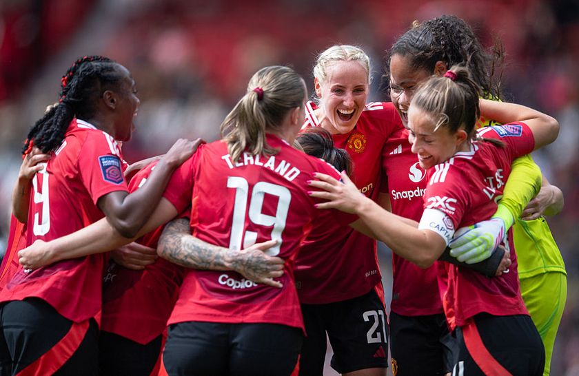 Millie Turner of Manchester United celebrates with team mates during the Barclays Women's Super League match between Manchester United and Manchester City at Old Trafford on May 04, 2025 in Manchester, England. 