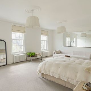 bedroom with white walls and white windows