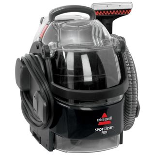 A black Bissell carpet cleaner