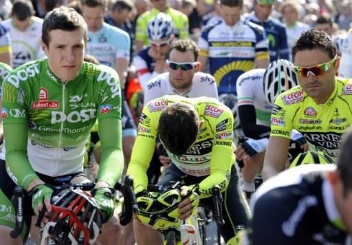 Riders observe a moment of silence for victims of a Swiss bus crash