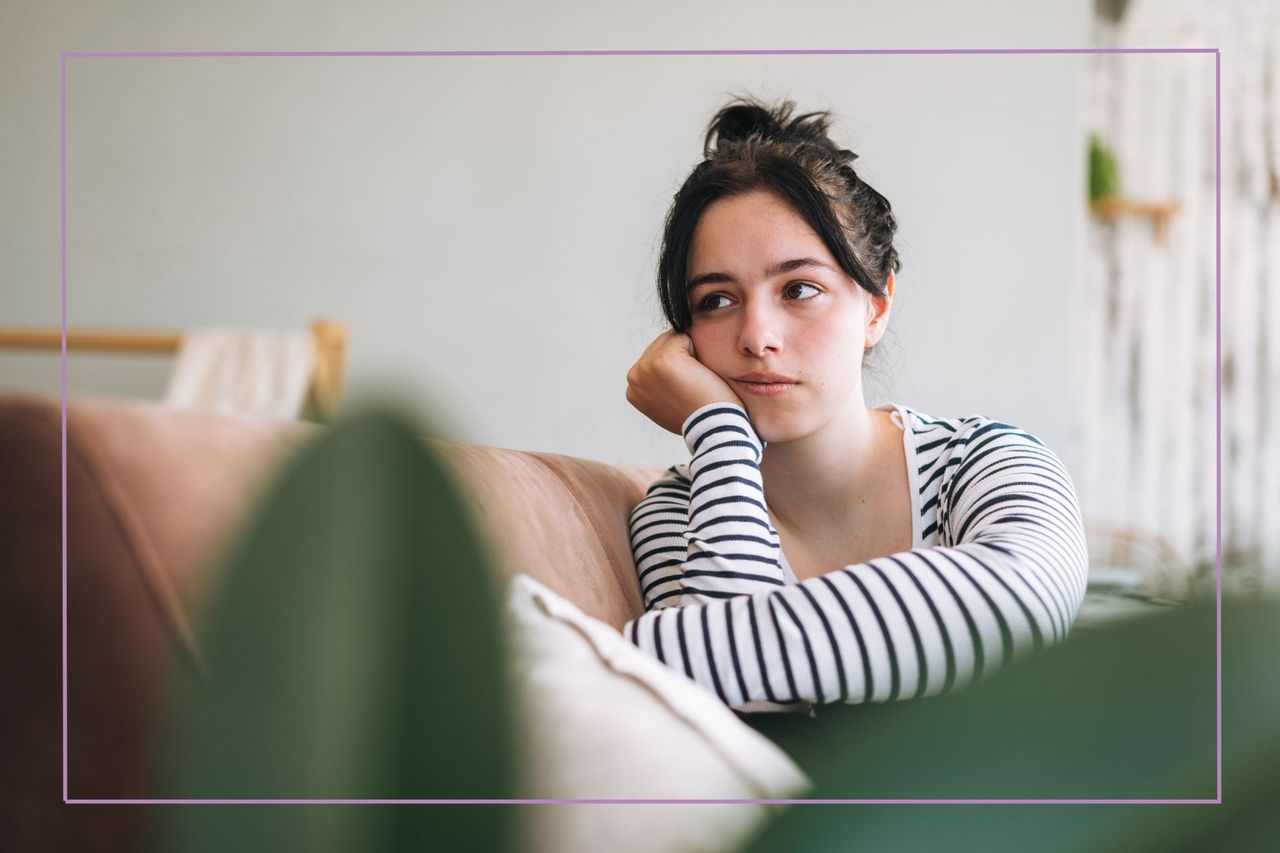 Sullen teenager sitting 