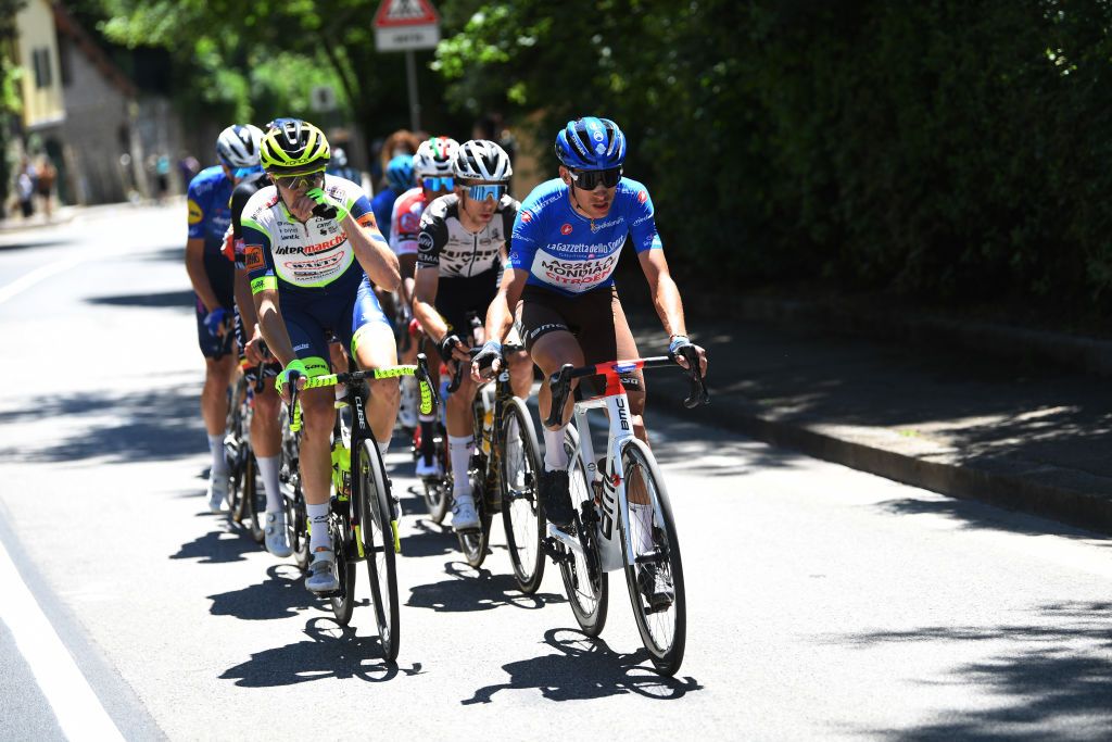 BAGNO DI ROMAGNA ITALY MAY 20 Simone Petilli of Italy and Team Intermarch Wanty Gobert Matriaux Geoffrey Bouchard of France and AG2R Citren Team Blue Mountain Jersey George Bennett of New Zealand and Team Jumbo Visma in the Breakaway during the 104th Giro dItalia 2021 Stage 13 a 212km stage from Siena to Bagno di Romagna girodiitalia Giro UCIworldtour on May 20 2021 in Bagno di Romagna Italy Photo by Tim de WaeleGetty Images