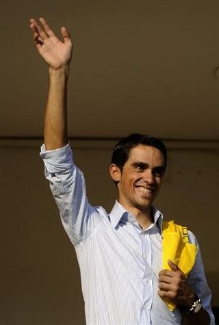 Tour de France champion Alberto Contador waves to supporters from a balcony in his home town of Pinto, near Madrid.