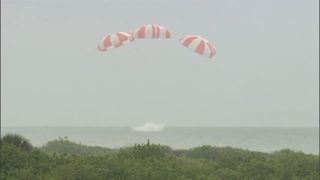 SpaceX's Dragon crew capsule splashed down in the ocean off the coast of Florida after a successful test of the launch escape system on May 6, 2015..