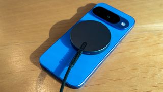 Pixel 10 with an ESR Qi2 charger