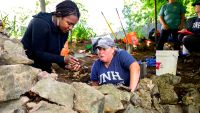 Left to right, Kabria Baumgartner, Northeastern University historian, and Meghan Howey, University of New Hampshire archaeologist, at the dig site of what archeologists believe is the home of King Pompey.