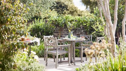 Small garden design tips from the experts: dobbies furniture on patio
