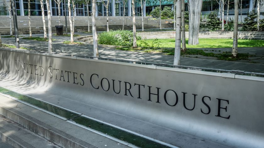 A cropped photo of the United States Courthouse sign in Seattle Washington