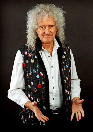 Brian May wearing a Brian May Guitars 'hold everything' waistcoat