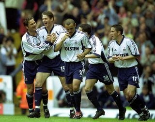 Willem Korsten (second left) celebrates with his Tottenham team-mates after scoring against Manchester United in May 2001.